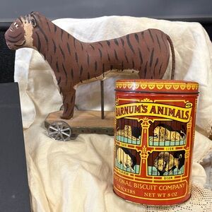 Circus Themed Decor. Barnum’s Animal Cracker Tin and Hand painted Tiger pull toy